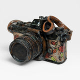 Camera, red flowers