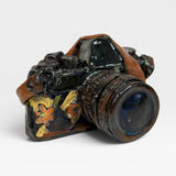 Camera, orange flowers