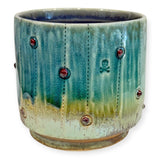 Faceted Cup - dots and skulls