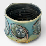 Tea Bowl with Slip Lines & Skulls